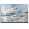 Pintura de playa al amanecer pintada a mano en acrílico con relieve táctil. Diseño moderno en azul, gris, dorado y ocre para decorar salas.